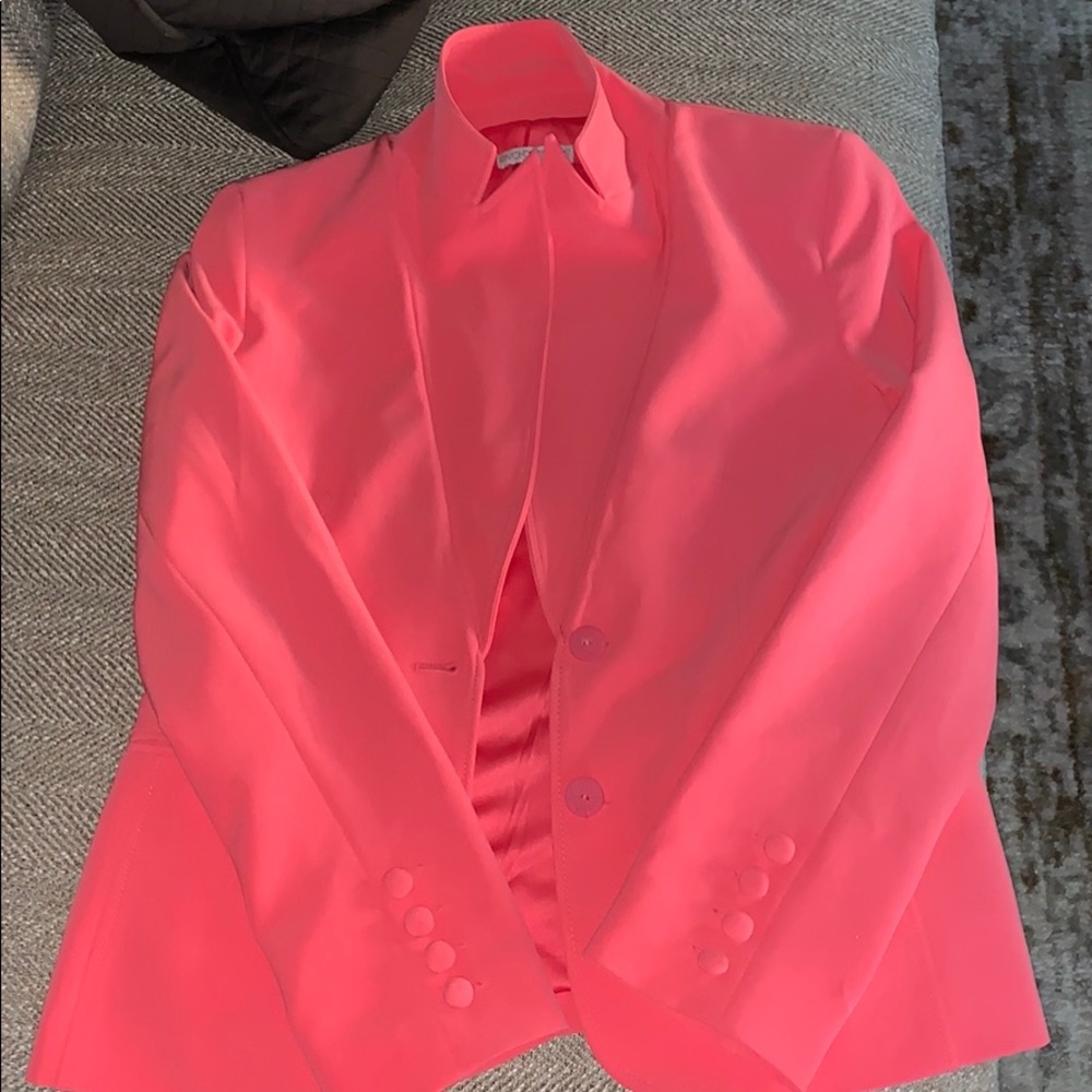 Bright coral business suit